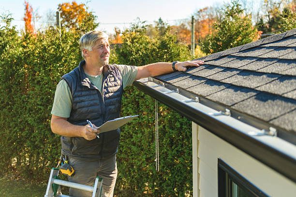 Professional Roof Replacement technician working in Winterset, IA